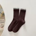 Women brown mid-calf socks with grey ruffle cuff and cable knit pattern, autumn style variant. - One Size / Coffee