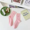 Cute pink ruffle trim mid-tube socks with sweet floral embroidery for women daily wear. - One Size / Pink