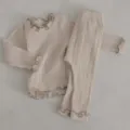 Infant ribbed cotton long sleeve top and pants set detail view, soft lettuce edge trim. - 66cm / Apricot