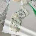 Chaussettes mi-hautes en coton crocodile blanc, bas tendance pour un style de vie quotidien. - Taille unique / Dinosaure