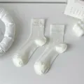 Cute white ribbed mid-tube socks for women with lovely bow detail, sweet Japanese style daily wear. - One Size / White