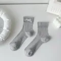 Grey ribbed mid-calf socks for women featuring a cute white bow, sweet Japanese style daily wear. - One Size / Gray