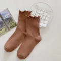 Brown women long cotton socks with lettuce edge design, ideal for autumn and winter. - One Size / Light Coffee