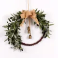 Artificial olive leaf wreath detail showing vintage wooden beads, burlap bow and cute hanging bells. - 73238 Burlap Bowknot + Bell