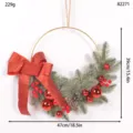 Christmas wreath decoration with pine needles red bow and berries for front door hanging. - Red