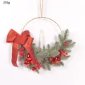 Christmas decorative candlestick wreath with pine needles, red berries, bow and candle. - Red + Candle
