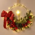 Christmas decorative candle wreath with LED lights, pine needles and red bow for holiday decor. - Red + Candle + Light