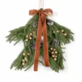 Christmas star rattan wall hanging with pine cones, berries and bow for holiday home decor. - Gold 86514