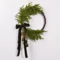 Christmas decorative wreath with Norfolk pine, wooden beads and velvet bow for door wall decor. - Standard Type / L