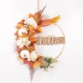 Autumn iron art wreath wall hanging with faux maple leaves, white pumpkins and hello letters. - HELLO Style