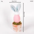 Easter egg bunny potted ornament with blue plush ears and moss terracotta pot for home decor. - Pink