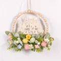 Easter wooden bead wreath detail view featuring cute bunny sign, green leaves and pastel eggs. - 87118 Knitted Flower+Rabbit Sign