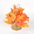 Detailed close-up view of artificial autumn harvest pumpkin and colorful maple leaf tabletop decor. - Metal Tray Pumpkin Decor / 86030
