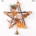 Wooden star Christmas wreath hanging ornament with pinecones and dried orange slices. - Style 86165