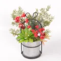 Christmas artificial succulent and red berry potted plant with iron bow frame detail. - 86270 (With Flower Stand)