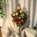 Close-up detail of autumn artificial flower bouquet featuring vintage roses and eucalyptus. - Bouquet 96739