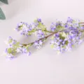 Close-up view of purple artificial osmanthus flower branch for home decor and floral arrangements. - Leafless Purple Blue