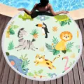 Detailed view of round beach towel featuring cute jungle animals print and stylish fringe design. - Tropical Animals (11)