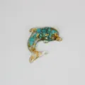 Resin dolphin ornament decorated with turquoise stones and gold foil flakes, perfect craft accessory. - 6.5*5.5*1cm / Turquoise