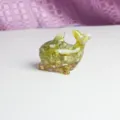 Handmade resin dolphin figurine filled with natural crystal chips for home and office decor. - Topaz