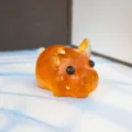 Detailed view of a cute crystal resin pig figurine, ideal for car and home interior decor. - 5.5*3.5*3cm / Citrine