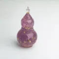 Crystal resin gourd detail showcasing purple crystal chips and gold foil flakes inside - Lavender