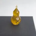 Detailed shot of the crystal crushed stone drop glue gourd desktop ornament craft gift. - Glassy Yellow