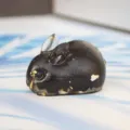 Black resin bunny figurine with gold flake accent cute animal desktop ornament gift - Obsidian