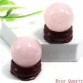 Natural rose quartz crystal sphere with wooden base, ideal for home decor and DIY jewelry making. - Rose Quartz / 2.0cm
