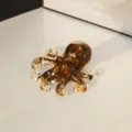 Handcrafted resin octopus figurine filled with crystal chips and gold flakes for home desk decor - Tiger Eye Stone Bracelet