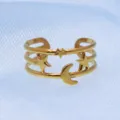 Anillo abierto de acero inoxidable dorado con dijes de estrella y luna para uso diario - Estilo Estrella Luna