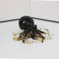 Resin octopus figurine with gold flakes, crystal clear marine animal desktop decor craft. - Obsidian