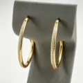 Pendientes de aro de acero inoxidable chapado en oro con circonitas, elegantes para mujeres. - Dorado