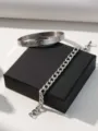 Stainless steel Roman numeral bangle and Cuban chain bracelet set, high-end jewelry style. - Roman Numeral Bangle and NK Chain Bracelet Set
