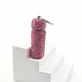 Pink rhinestone refillable bottle keychain detail view, sparkling diamond charm for bag. - Pink
