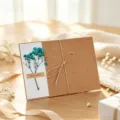 Kraft paper dried flower greeting card with blue baby's breath and twine bow for gift. - Blue Baby's Breath (Artificial)