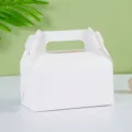 Primer plano detalle de la caja de papel blanca para repostería, embalaje de panadería. - Caja de Mano de Panadería (2337#) / 16cmx10.2cmx9cm / Blanco