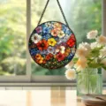 Stained glass floral suncatcher detail view, colorful circular hanging window decor panel. - 15x15x0.3 cm / Multicolor Floral