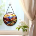Stained glass hanging suncatcher panel featuring a colorful scenic mountain landscape design. - Landscape Scenery
