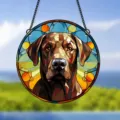 Acrylic dog stained glass pendant detail showing colorful geometric patterns and metal chain. - 6