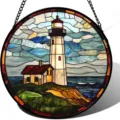 Detailed shot of round stained glass style lighthouse hanging suncatcher with metal chain. - 9