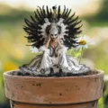 Garden decorative stake detail view, black and white feathered mask design for outdoor lawn patio. - Black and White Feather Mask Style / 10cm Size