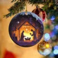 Detailed close-up view of the decorative nativity hanging pendant on a festive tree setup. - JH2