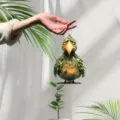 Close-up of a cute green bird acrylic pendant, perfect for car hanging or backpack decor. - 8cm / JH1