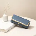 Blue leather glasses case with gold kiss lock frame, premium portable storage pouch detail. - Denim Blue