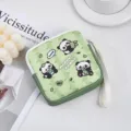 Detailed close-up of a cute green panda print canvas coin purse with a handy wrist strap. - Upgrade Version / Three Pandas