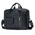 Detailed view of black leather business briefcase with zipper pockets and shoulder strap. - Black