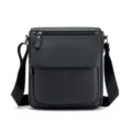 Close-up detail of the black genuine leather men's messenger bag with metal zipper. - 24x8x27cm / Black