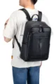 Detailed view of large capacity black genuine leather backpack for men, casual business. - B013 / Black