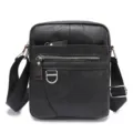 Leather messenger bag detail shot with metal zipper and adjustable shoulder strap - 8 Inch / Black